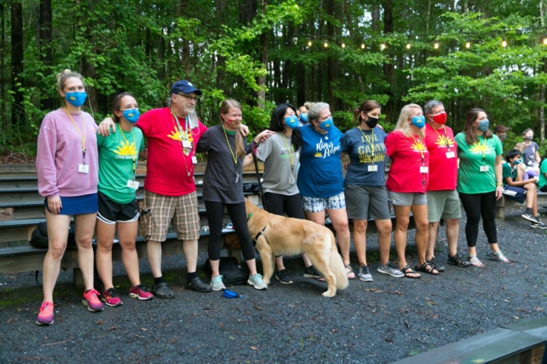 Family-Camp-6-20-21-131-volunteers-arm-in-arm